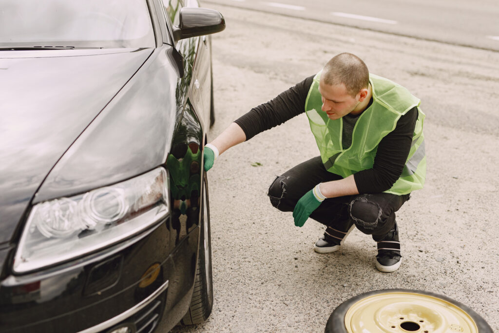 Pothole damage to tyres in London showing sidewall bulge and cracked alloy wheel after hitting a deep road pothole